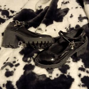 Black Mary Jane style shoes